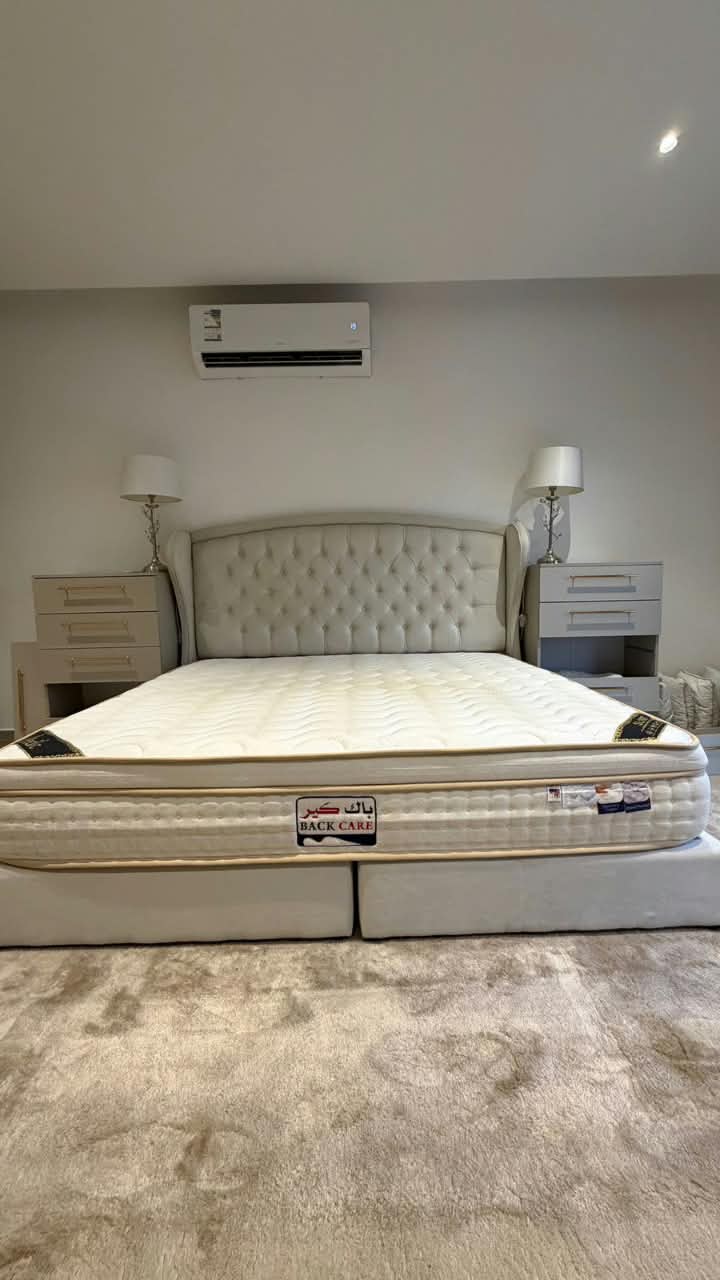 King bed, mattress and side tables reinstalled in a customer bedroom